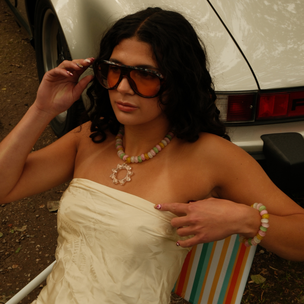 Model wearing the Candy Stone Bracelet with pastel cat-eye beads by Babs The Label