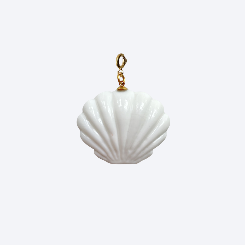 Mermaid 2.0 Pendant featuring a handmade white glass shell from India.